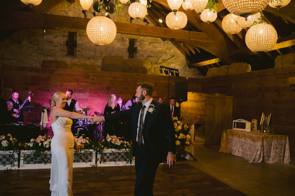 Bride and groom's first dance at their Wisconsin destination wedding at Whistling Straits.