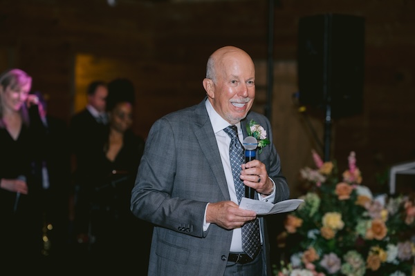 Father of the bride making a toast at his daughter's Whisting Straits wedding.