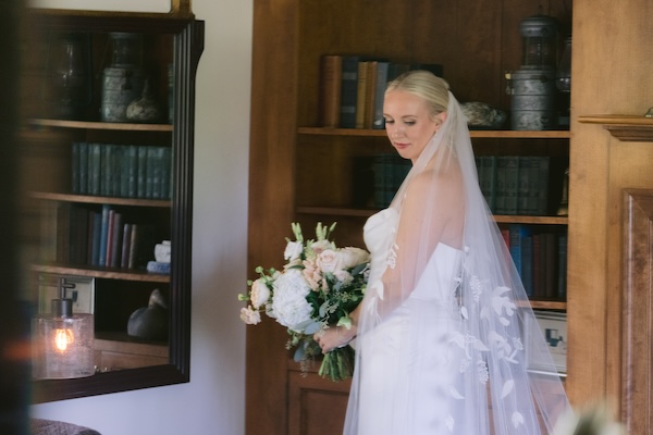 Bride holding her bouquet at her Wisconsin destination wedding.