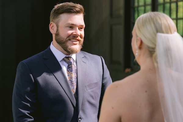 Bride and groom's first look at their Wisconsin destination wedding at the Kohler Resort.