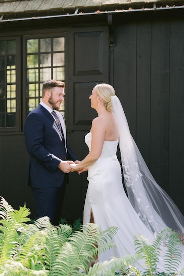 Bride and groom's first look at their Wisconsin destination wedding at the Kohler Resort.