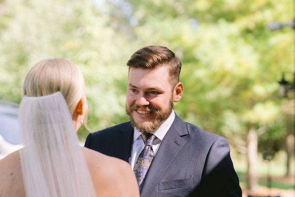 Bride and groom's first look at their Wisconsin destination wedding at the Kohler Resort.