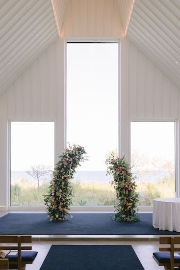 Deconstructed wedding arch inside the beautiful, modern Straits Chapel.