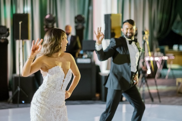 Bride and groom adding a little South Asian fklair to thei first dance.