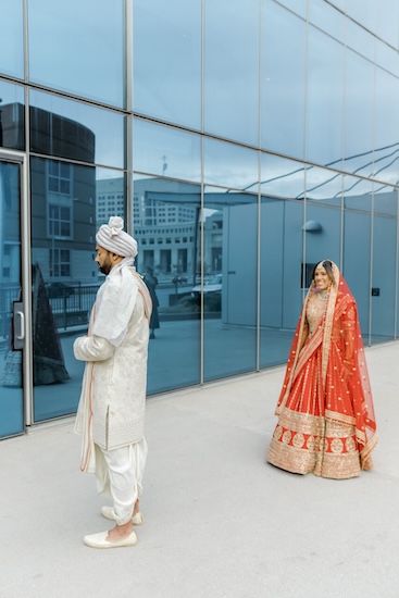 Bride and groom's first lookmbeofre thier Indianapolis Hindu wedding ceremony.