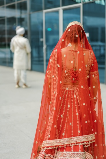 Bride and groom's first lookmbeofre thier Indianapolis Hindu wedding ceremony.