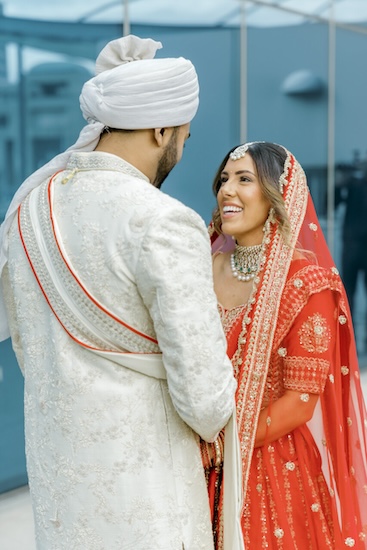 Bride and groom's first lookmbeofre thier Indianapolis Hindu wedding ceremony.