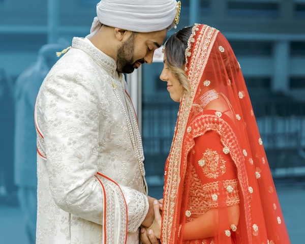 Bride and groom's first lookmbeofre thier Indianapolis Hindu wedding ceremony.