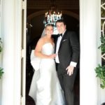 Bride and groom on the steps of the Governor Thomas Bennett House in Charleston South Carolina