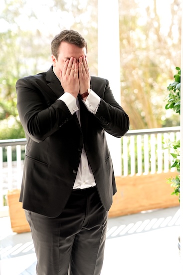 Groom overwhelmed with emotion seeing his bride to be