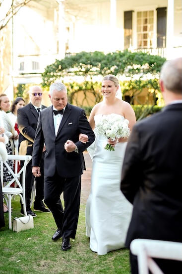 Bride and her father walking down the aisle of her Charleston destination wedding