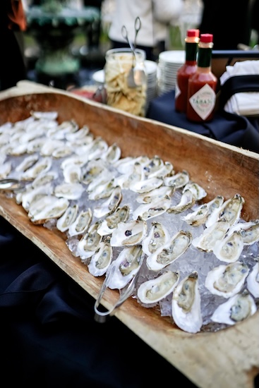 Oysters on the Hlaf Shell for cocktail hour of a Charleston destination wedding