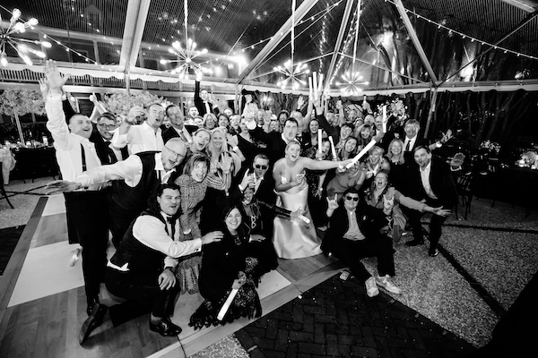 Newlyweds and their guests at the end of their Charleston  destination wedding