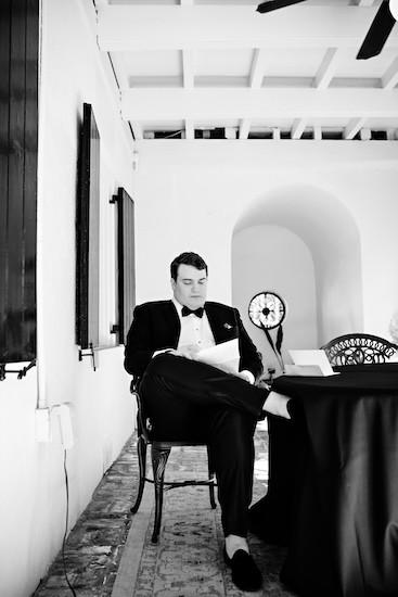 Groom relaxing on the front porch of the governor Thomas Bennett House beofre he sees his bride to be 