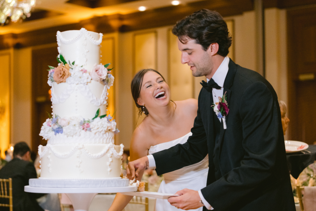 cake cutting at wedding reception at arts garden