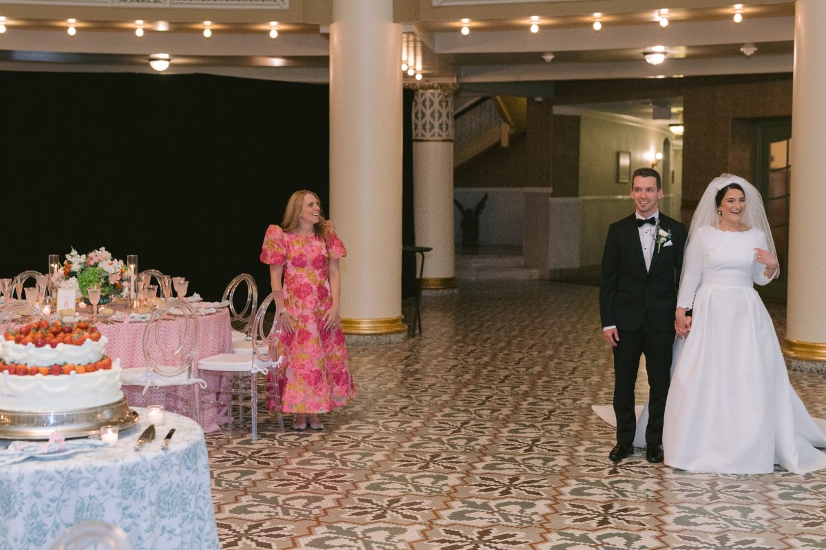 bride and groom seeing wedding reception with wedding planner at wedding West Baden Springs Resort